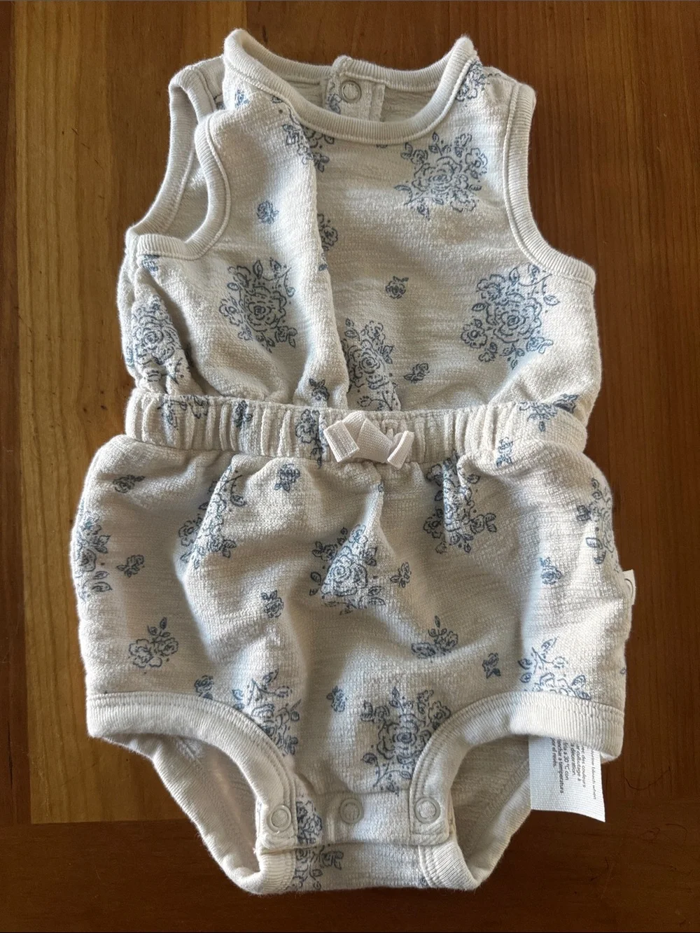 Little Planet Cream Romper with Blue Floral Print organic cotton